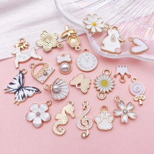 Collection de breloques DIY en alliage avec motifs lapin, cerf et fleurs blanc et rose