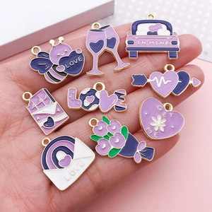 Purple alloy charms set with bee, car, and heart shapes with gold edges for DIY crafts