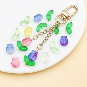 Tulip flower keychain with colorful resin beads and gold metal links on white display