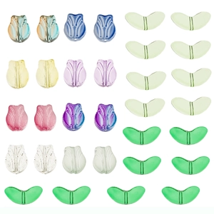 Colorful tulip and leaf glass beads set for DIY jewelry making on white background