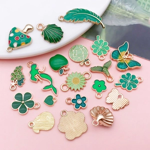 Assorted green enamel alloy charms with gold plating for DIY jewelry making and crafts