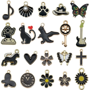 Lot de 20 pendentifs en émail noir et doré motif chat oiseau et fleur pour bijoux DIY