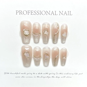 Nude pink and silver glitter gradient press-on nails with shell and pearl decor