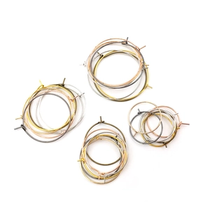 Detail view of colorful DIY hoop earring findings in gold, silver and rose gold finishes