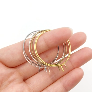 Detail of round metal earring hoops in gold, silver, bronze and rose gold for DIY jewelry