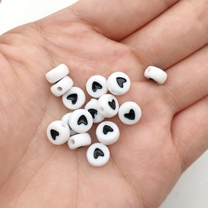 Acrylic flat round white beads with black heart pattern for DIY bracelet making