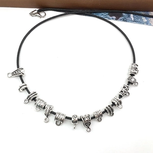 Retro silver alloy connector beads on a black cord necklace for jewelry making