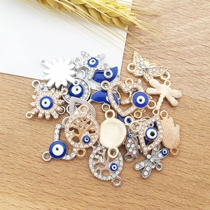 Collezione di ciondoli Evil Eye e mano di Hamsa con cristalli per gioielli fai-da-te