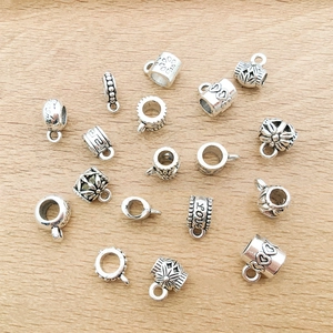 Macro detail of antique silver alloy large hole beads and charms for DIY jewelry making