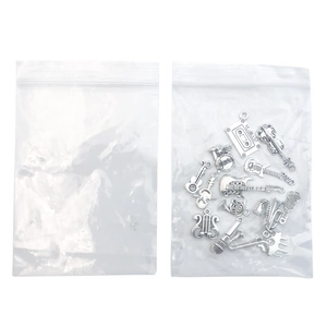 Vintage silver musical instrument charms set including guitar violin and saxophone shapes