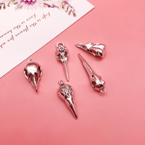 Five retro gothic bird skull pendants in polished silver finish for DIY jewelry crafting