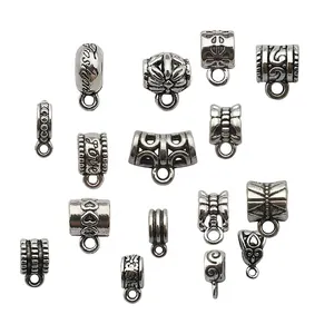 Detailed collection of vintage silver alloy spacer beads and charms for DIY jewelry making