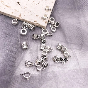 Vintage silver jewelry connectors with embossed floral patterns for DIY bracelets