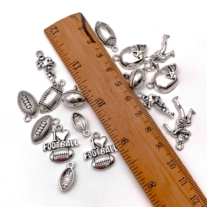 Antique silver zinc alloy football themed pendants with helmet and player for DIY jewelry