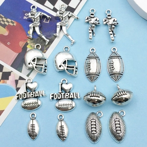 Set of 8 antique silver rugby charms for DIY jewelry featuring helmets and footballs