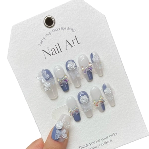 Handmade press-on nails in blue and white with 3D butterflies and roses set