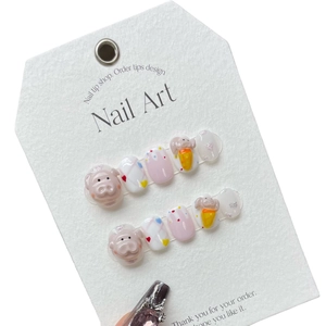 Handmade press-on nails featuring 3D pink pig design and carrot charms on 10pc round tips