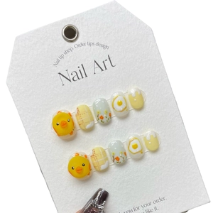 Handmade press-on nails set featuring cute yellow 3D chicken and floral designs