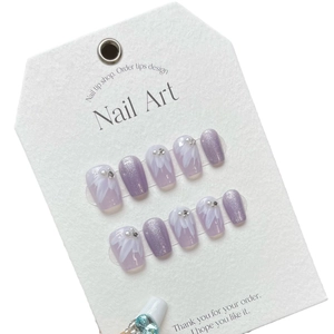 Short coffin press-on nails with lavender glitter, white daisy petals and pearls