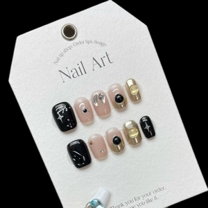 Handmade press-on nails set with mirror graffiti heart and celestial sun art on black base
