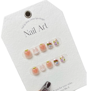 Press-on nail set featuring 3D peach designs, rainbow clouds and sweet floral motifs