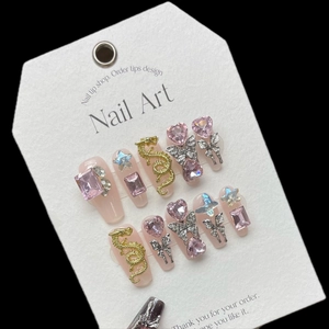 Handmade coffin press-on nails with 3D dragon wings and crystal butterfly accents