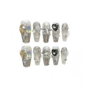 Handmade press-on nails with grey gradient, diamonds, pearls, and heart charms
