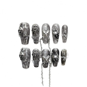 Handmade punk press-on nails with silver metal skull and gothic cross charms