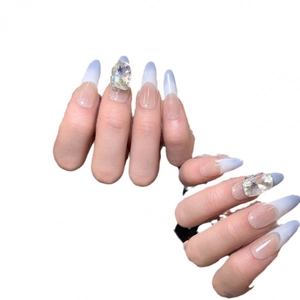 Handmade light blue gradient long stiletto press-on nails with luxury large rhinestones