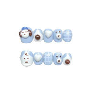 Handmade light blue and white press-on nails with 3D cartoon dog and heart patterns
