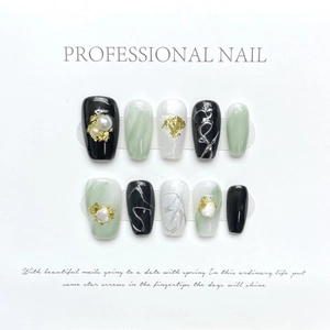 Handmade emerald green marble press-on nails with gold foil and pearl accents