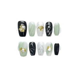 Handmade emerald green marble press-on nails with pearl accents and gold foil details