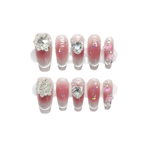 Pink cat eye handmade press-on nails with 3D floral crystals and heart charms
