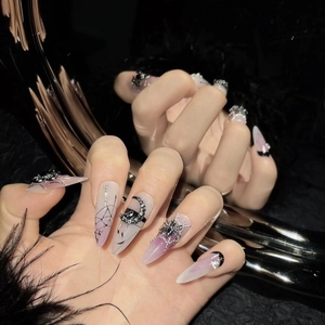 Gothic black and pink gradient press-on nails with silver spider and rhinestone accents