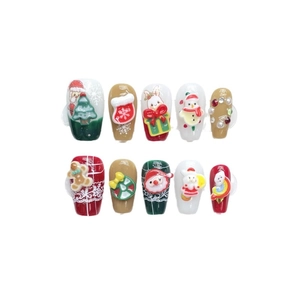 Christmas press-on nails set featuring 3D Santa, snowman, and tree designs on red and green