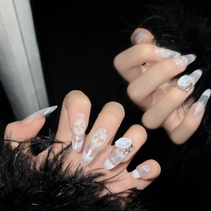 Long almond press-on nails with purple butterfly art, french tips, and 3D rhinestones