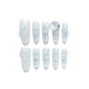 Iridescent butterfly press-on nails with long stiletto shape and crystal rhinestones