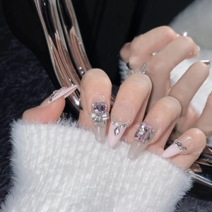 French bubble heart press-on nails with purple stones and silver beads on long stiletto shape