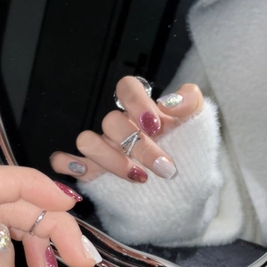 Cat eye press-on nails in burgundy wine with glitter and pearl white finish