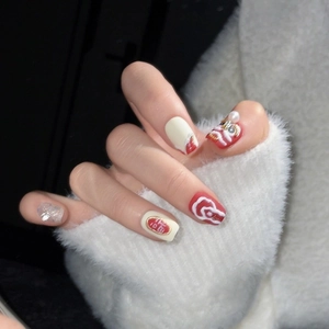 Chinese Lion Dance handmade press-on nails with red, white, and 3D pearl festive accents