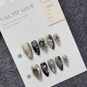 Faux ongles gothiques faits main avec roses noires, araignées et effet œil de chat