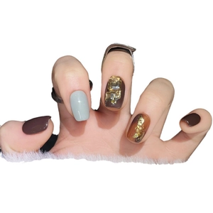 Handmade brown and grey press-on nails with amber gold foil and square rhinestones