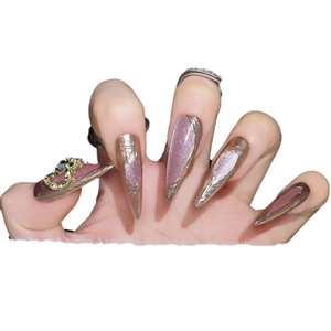 Handmade almond press-on nails with rose gold metallic finish and pink cat eye glitter