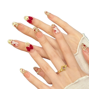 Pink cat-eye press-on nails with red velvet bows and cute white rabbit hand-painted art