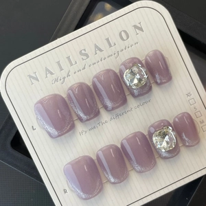 Handmade taro purple cat eye press-on nails set with large heart-shaped rhinestone accents
