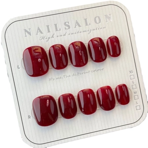 Glossy deep cherry red handmade press-on nails set of 10 on white display card