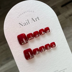 Deep wine red press-on toenails with glitter gradient on white display board