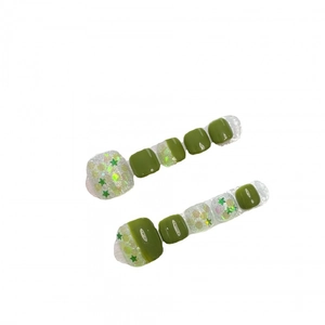 Olive green press-on toenails with silver glitter and star details on white background