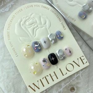 Star and ice cream themed press-on nails with 3D heart motifs in blue and yellow