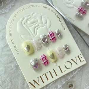 Handmade press-on nails with heart charms, chrome powder and pink plaid patterns